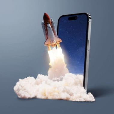 Rocket launching from smartphone screen, symbolizing digital marketing innovation and growth strategies for Bluemoon Creative Agency.