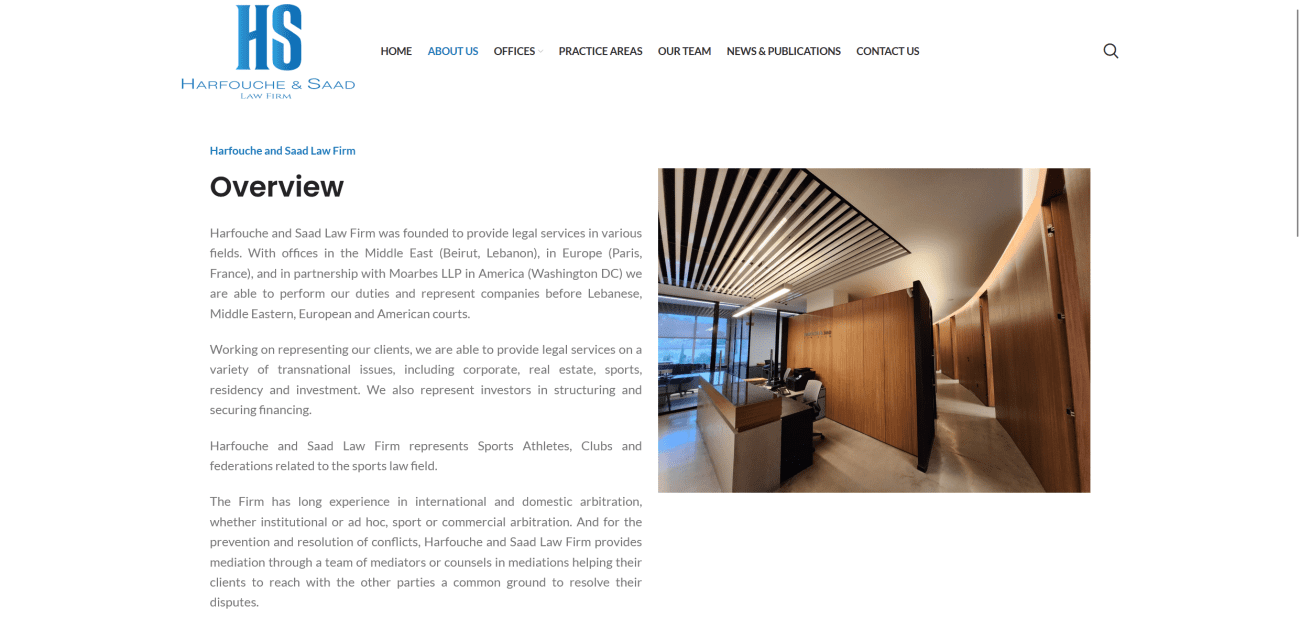 Modern office interior of Harfouche & Saad Law Firm, featuring wood paneling and sleek design, reflecting professionalism and legal expertise.