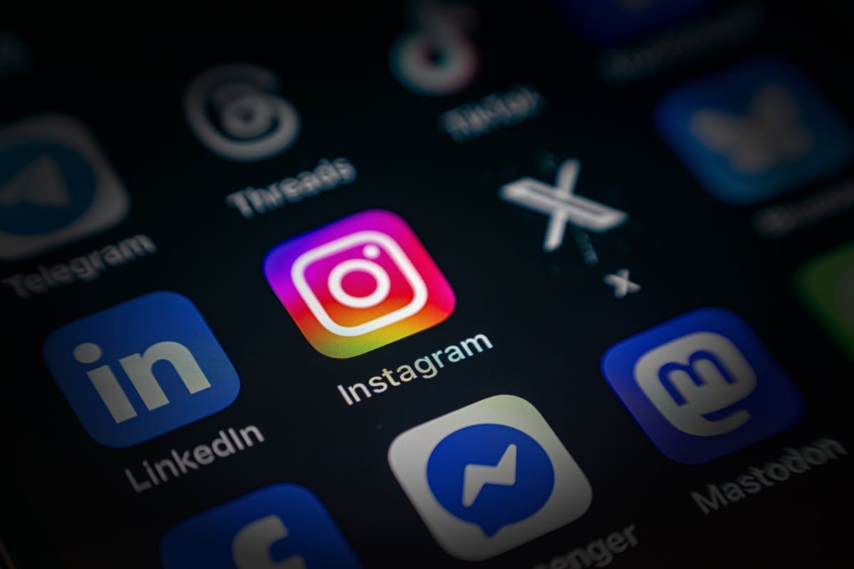 Instagram app icon on smartphone screen, highlighting social media presence and digital marketing strategies relevant to Bluemoon's services in Lebanon.