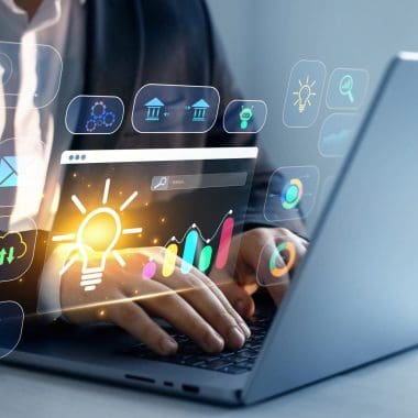 Digital marketing strategy and social media icons over laptop screen.